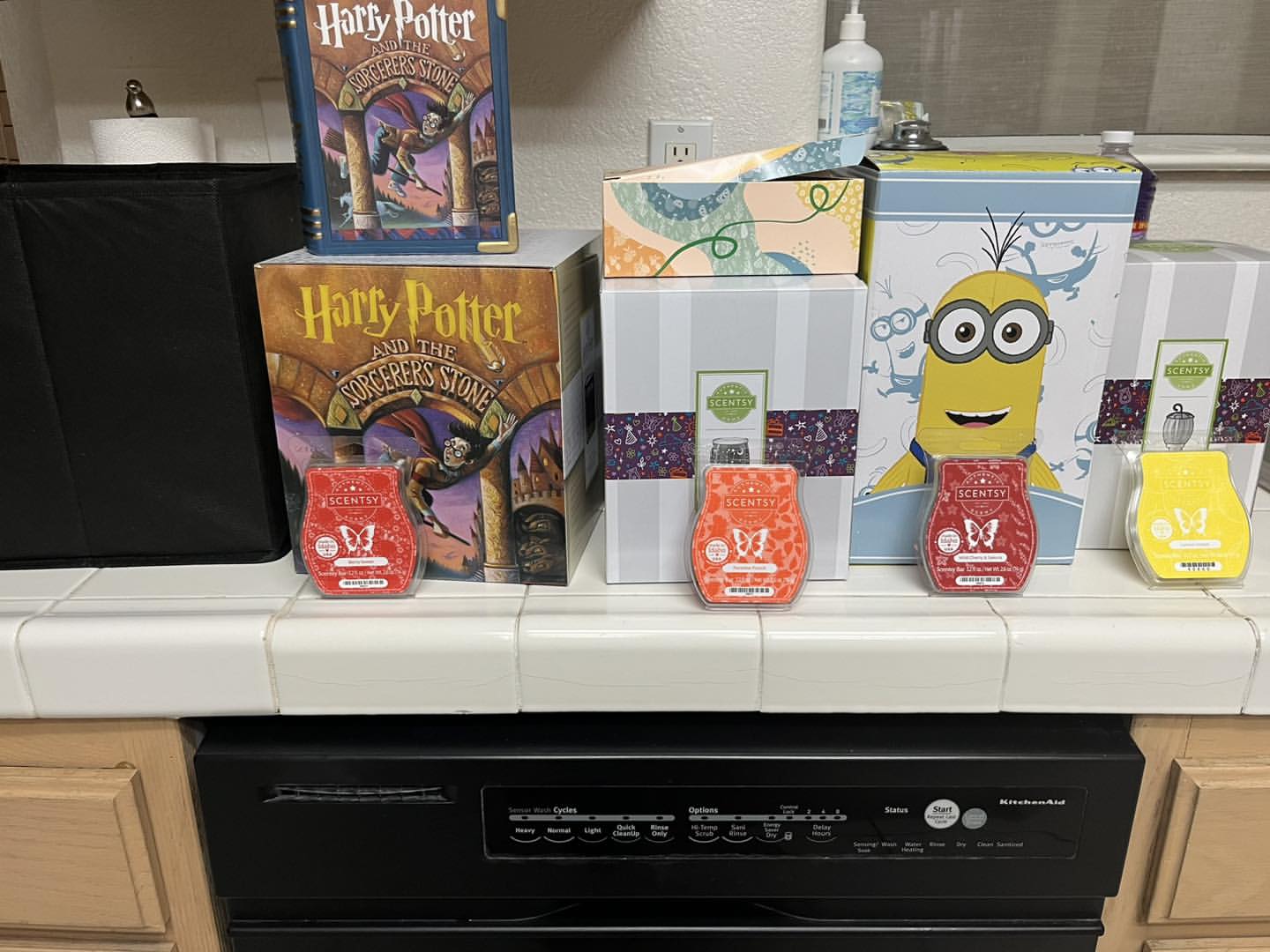Scentsy wax bars and licensed collection products displayed together